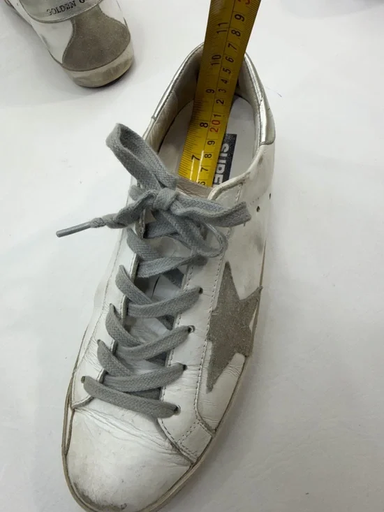 Golden Goose Deluxe Brand Super-Star sneakers in a white and silver colorway. - Picture 7 of 8